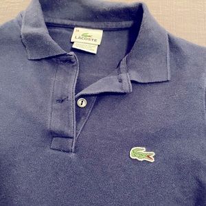 Lacoste petit pique polo, size 34 (basically equivalent to XS/XXS) Navy.